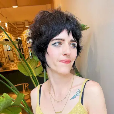 Short Wolf Cut with Bangs