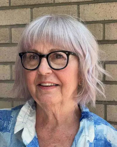 Textured Bob Hairstyle with Short Bangs for a Lady in Her 60s
