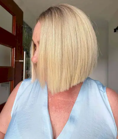 Trendy blunt cut blonde bob style for ladies in their 60s