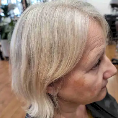 Gorgeous Gray Bob with Long Side Swept Bangs for Ladies Over Sixty